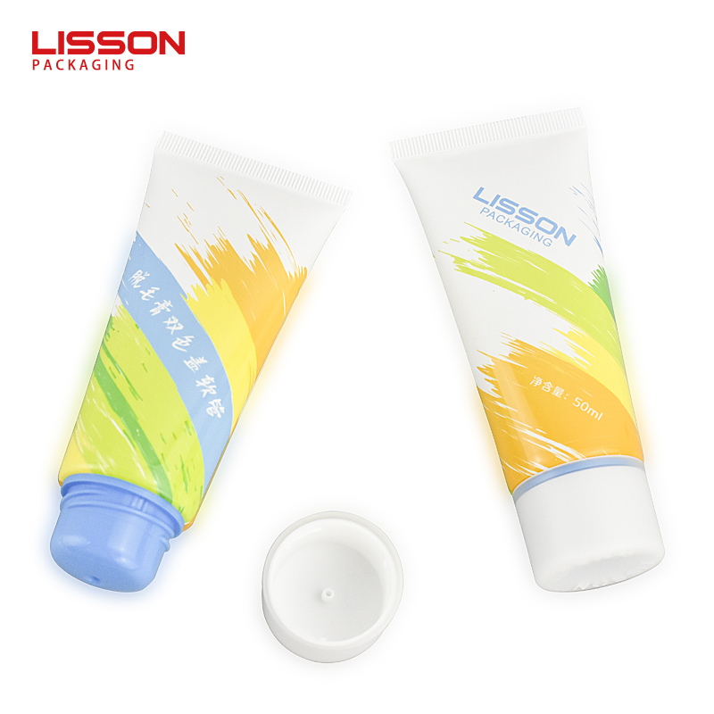 Crema depilatoria con tapón de doble color en tubo