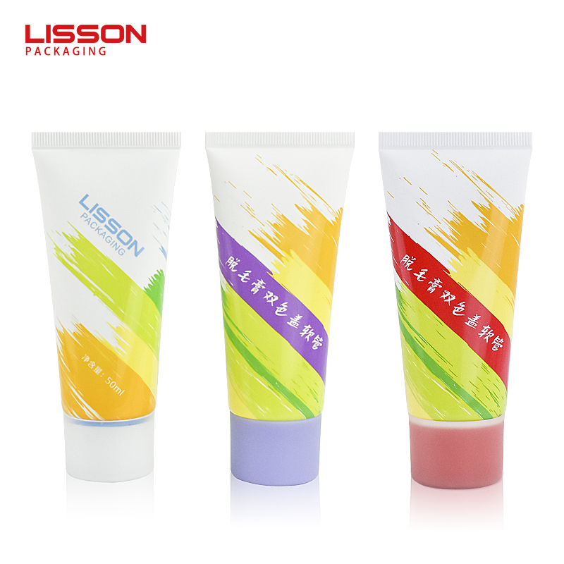 Crema depilatoria con tapón de doble color en tubo