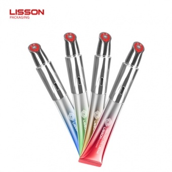 Tubo vibrador eléctrico innovador para crema de ojos con aplicador metálico.