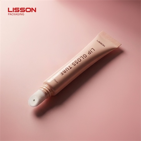 Tubo exprimible de brillo labial profesional con punta flocada