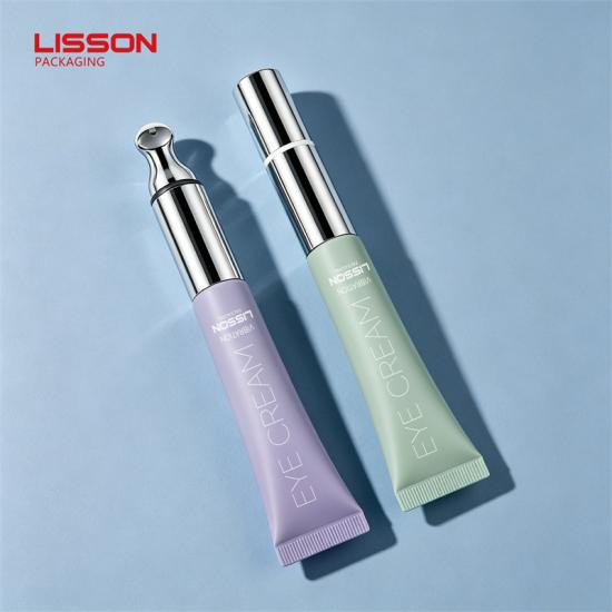Tubo de crema para ojos vibratoria con aplicador de aleación de zinc.
